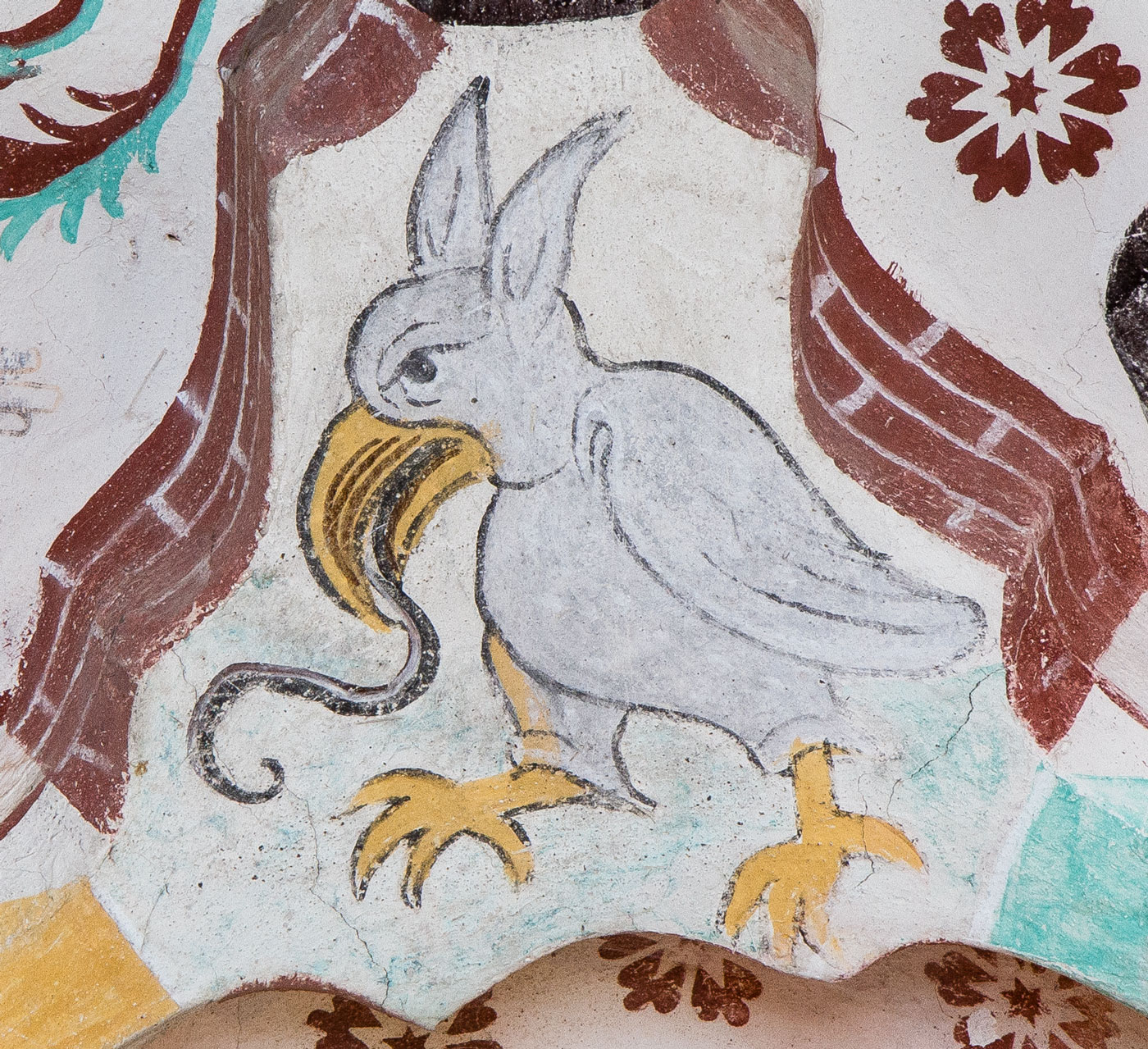Fågel med öron och kraftiga klor - Härkeberga kyrka