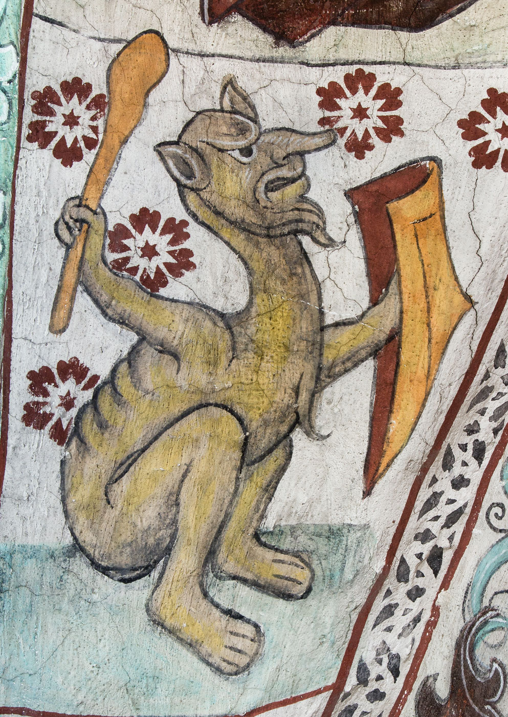 Djävulsliknande djur med sköld och klubba, symbol vreden (i detta fall Kains vrede) (S) - Härkeberga kyrka