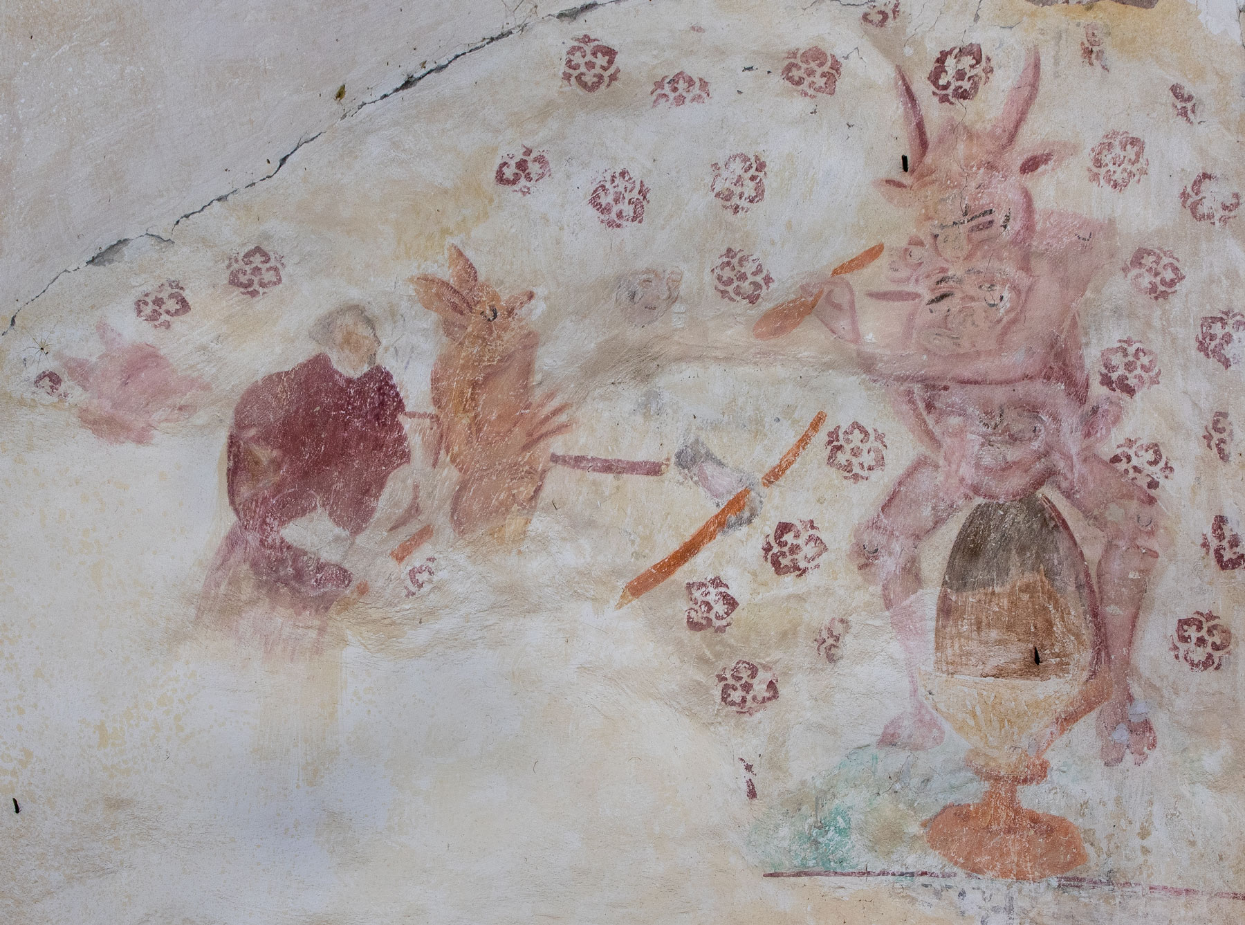 Två gummor på kvastar på väg till Blåkulla med två djävlar; Överdjävulen tronar på smörtopp och skedar ut ur ett smörjhorn - Österunda kyrka