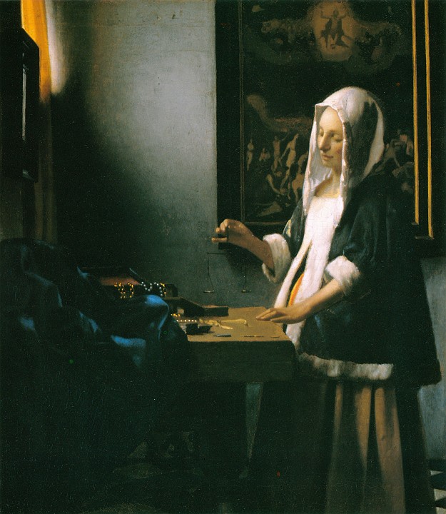 Vermeer_Johannes_-_Woman_Holding_a_Balance.jpg - Woman Holding a Balance (ca 1664)