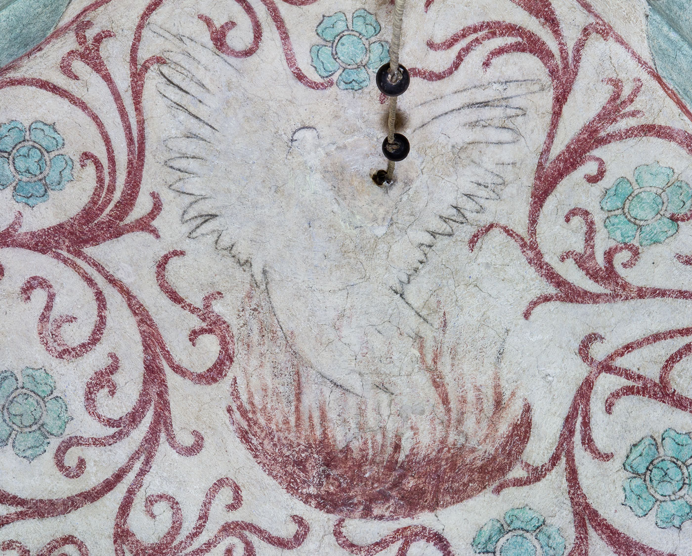 Fågel Fenix, symbol för Kristi död och uppståndelse, liksom även för bland annat kyskheten, hoppet och kyrkan - Lids kyrka