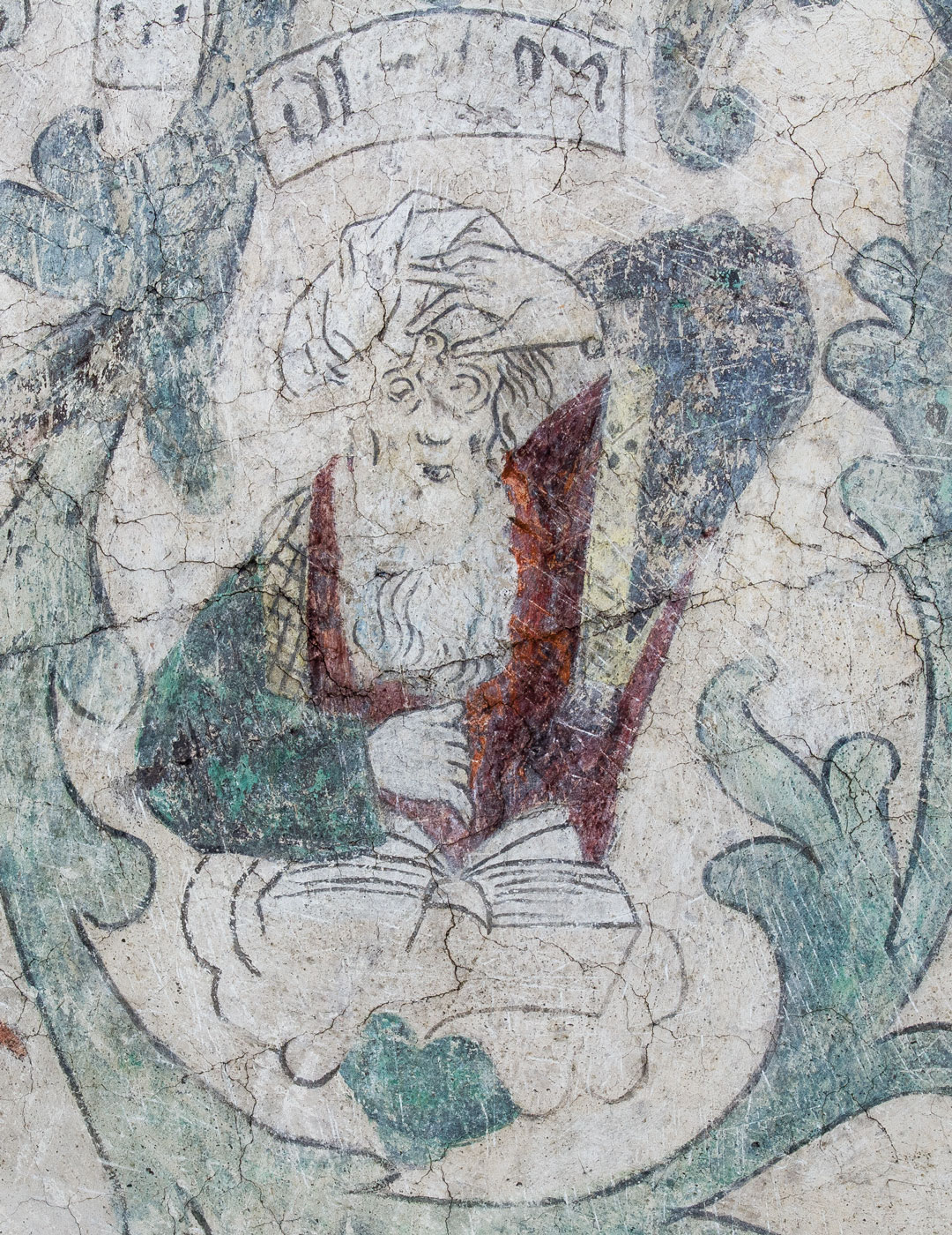 Abraham läser - med glasögon på näsan. Detalj ur Jesse rot - Torshälla kyrka