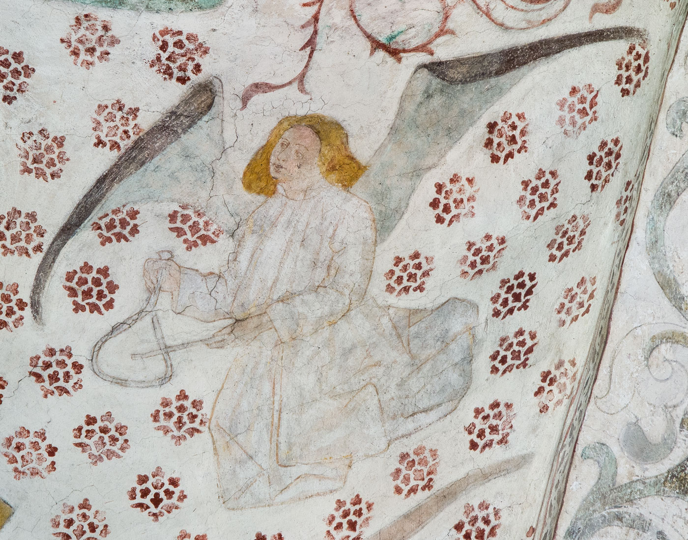 Musicerande ängel med triangel, detalj ur Nådastolen - Vänge kyrka